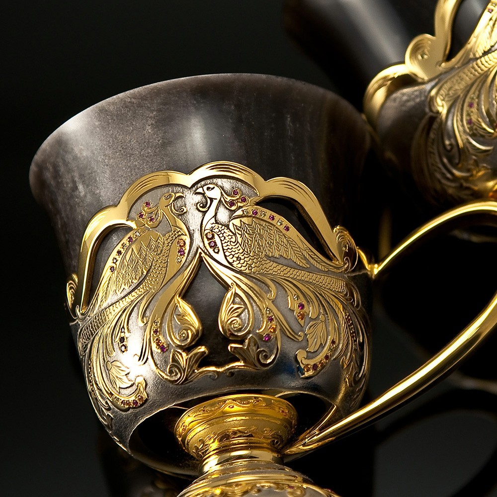 Luxury coffee mug carved in stone and decorated with gold and stones
