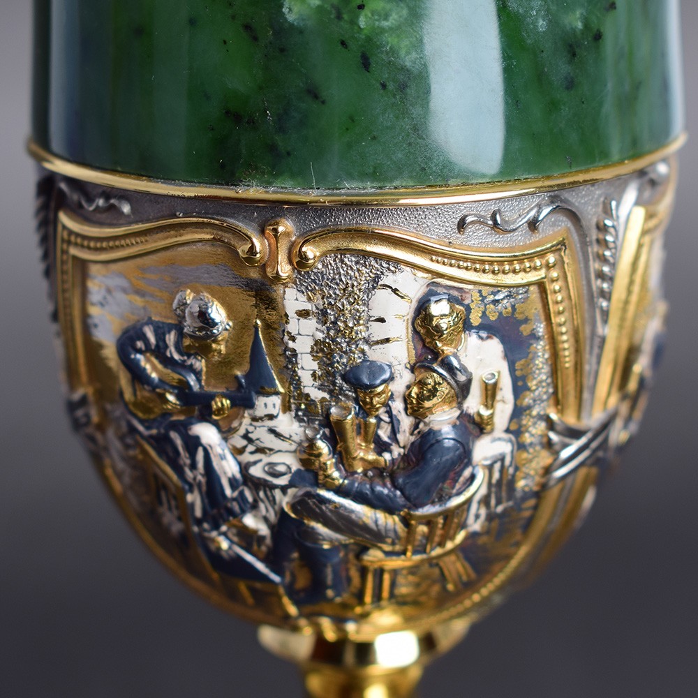Image of a girl with a glass on a jade glass