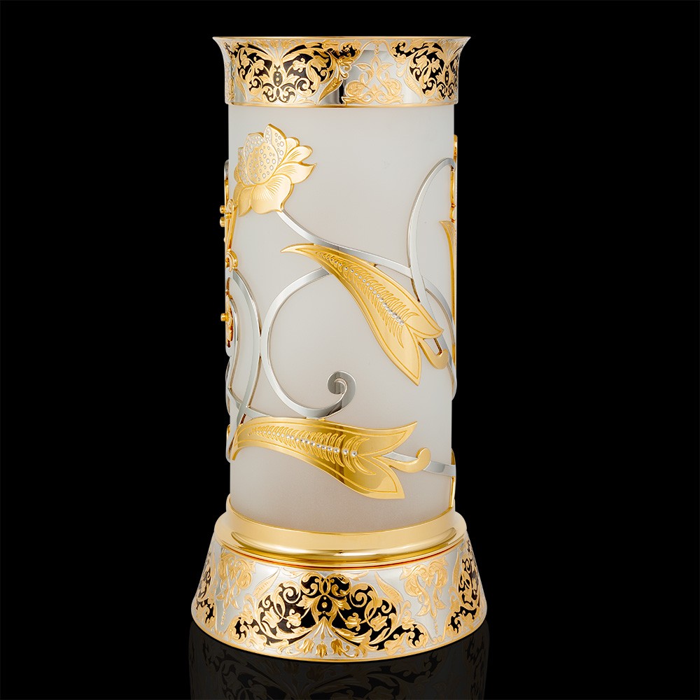 Designer vase made of frosted glass and gold. Decorated with carvings