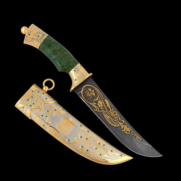 Damascus steel knife with a golden emblem of the UAE. Exclusive gift for men