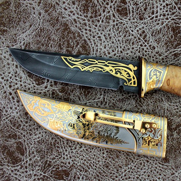 Gold plated knife. Handwork of artists, carvers, gunsmiths