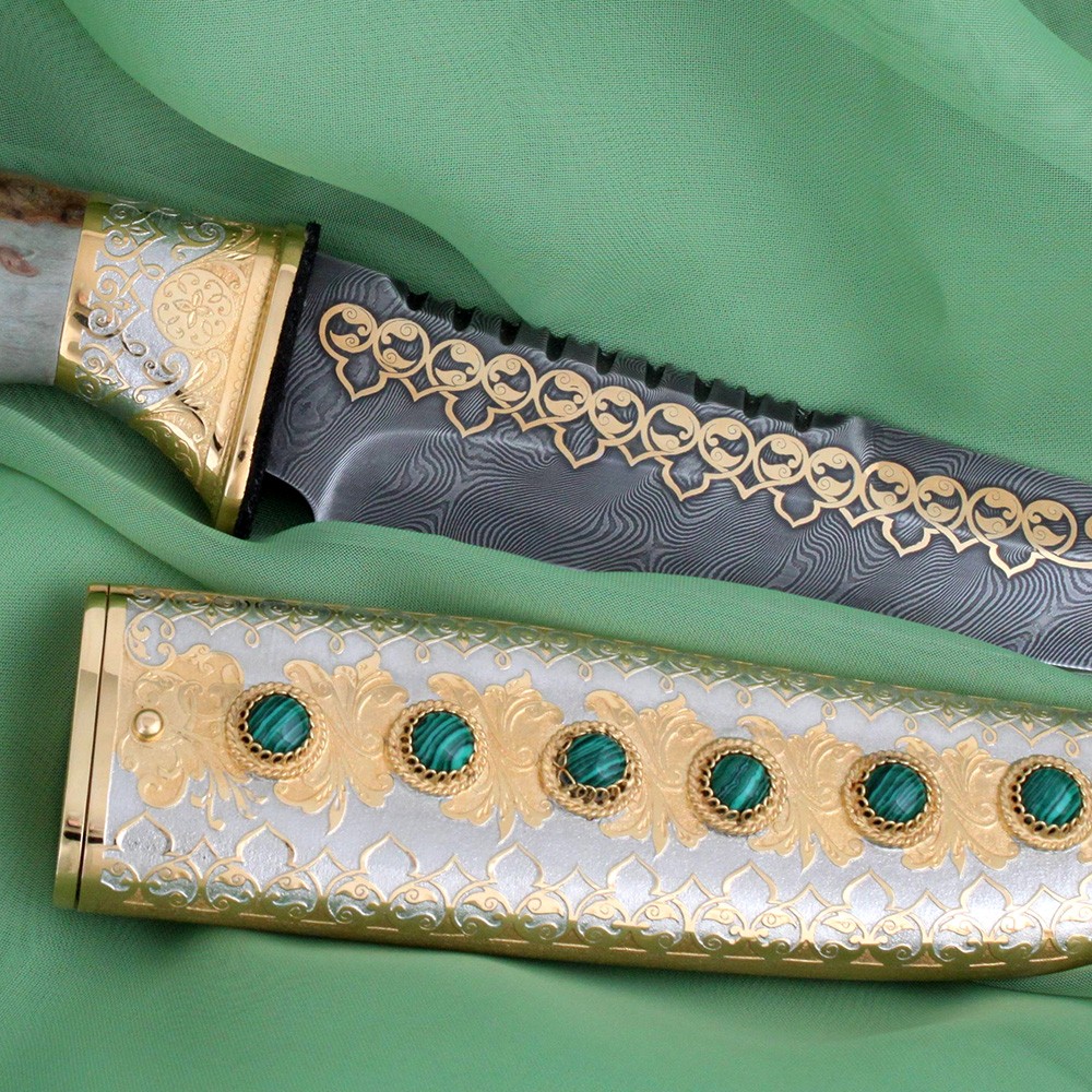 Decorated scabbard with cabochons of green malachite