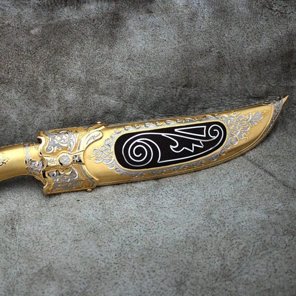 Golden decorated knife with sheath insert