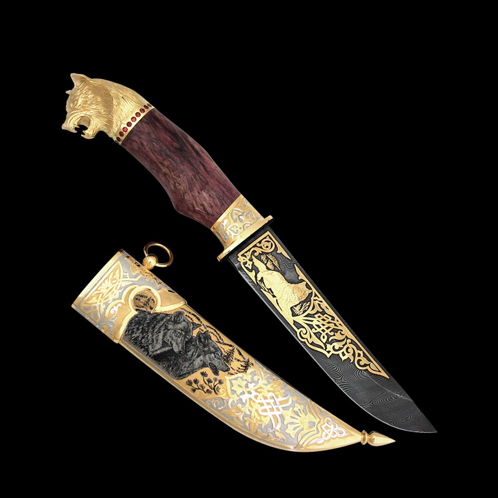 Luxurious wolf knife. This wild and beast adorns all elements of the knife from the scabbard to the head of the wolf on the handle