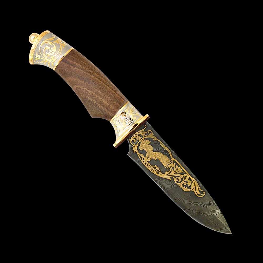 Classic knife with golden eagle decoration