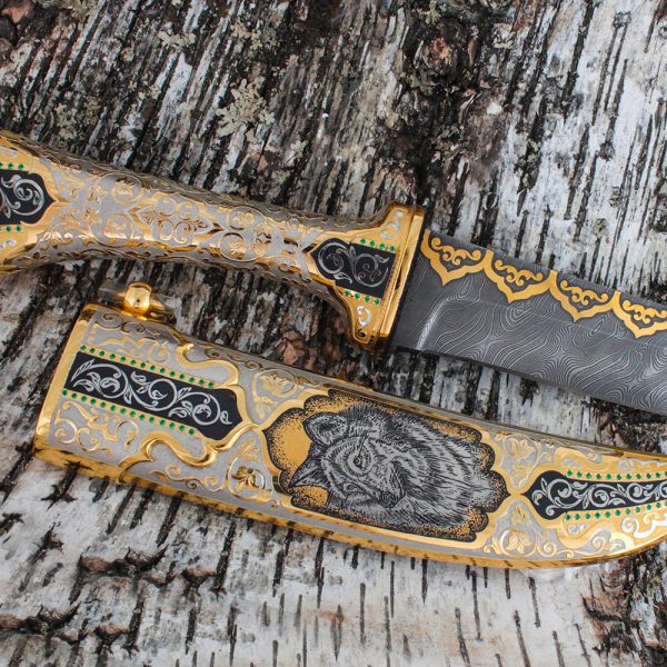 Golden Knife - Wolf. The decor of the knife is made in oriental style.