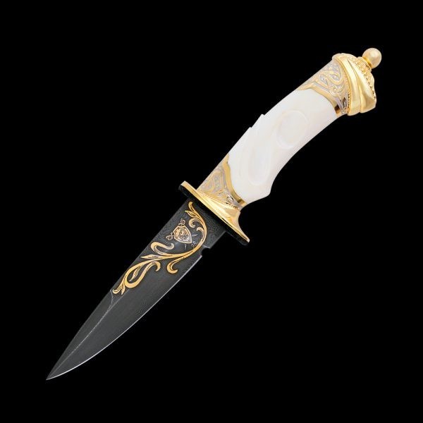 Damascus steel knife decorated with gold and a bone hilt