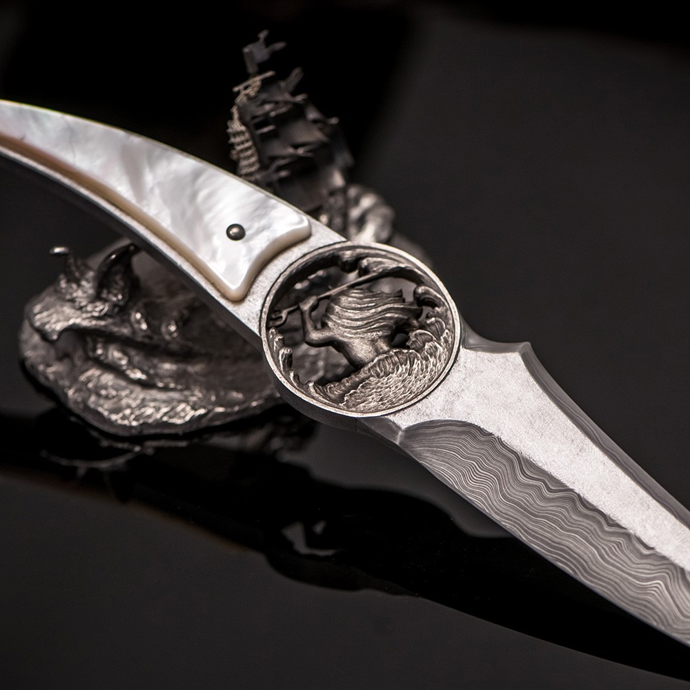Handmade knife from: Damascus steel, Mother-of-pearl, Rhodium plating 24K