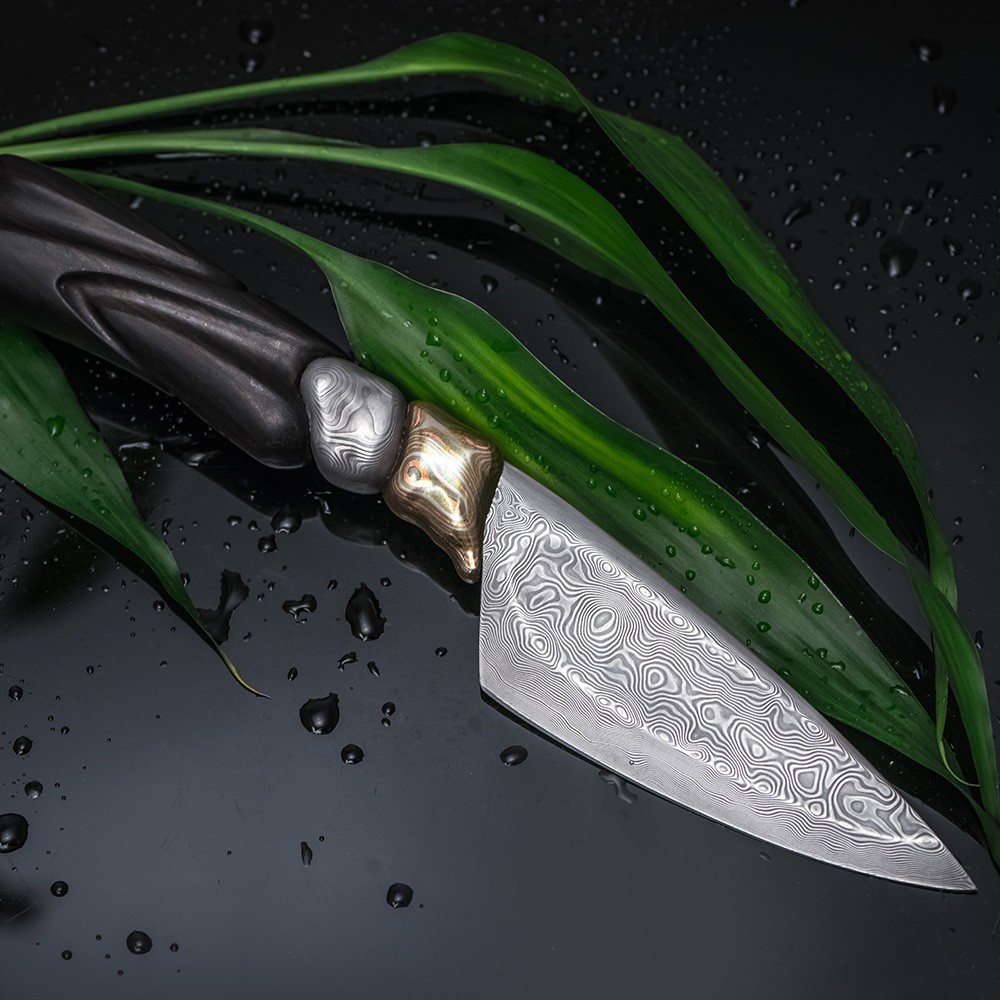 Elegant Japanese knife made of damask steel. Damascus work by Russian forge Vlaimir Gerasimov