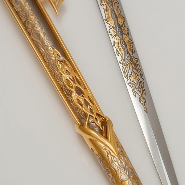 Kars dagger decorated with goldfish on a blade and pearls on a sheath