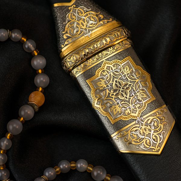 Amazing oriental ornament on the surface of the dagger