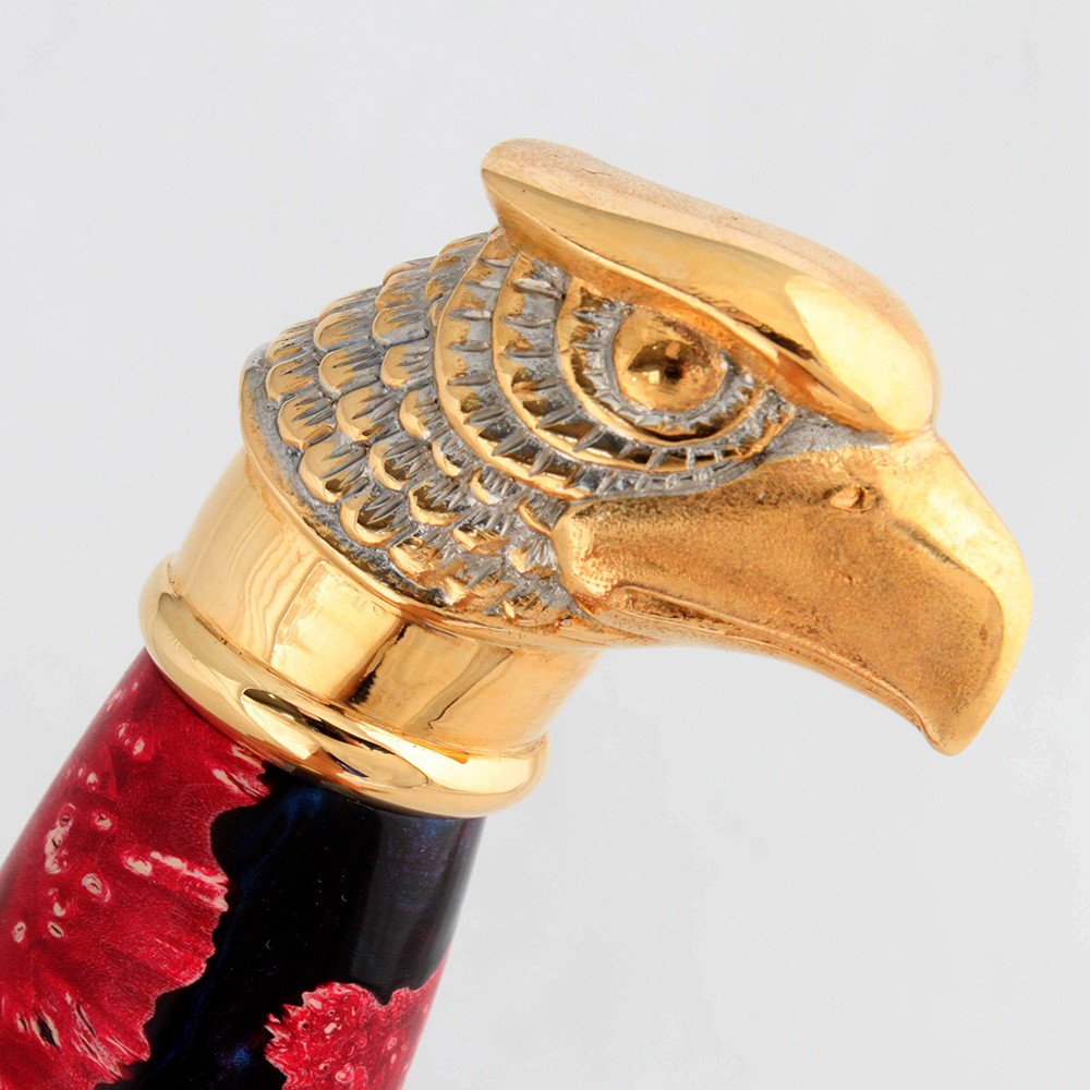 The top of the hilt is cast from metal in the form of an eagle's head.