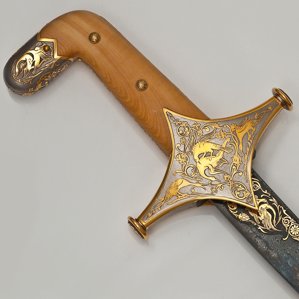 Handle of a traditional sword - Shamshir with a handle made of wooden plates