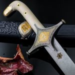 The Arabian sword Zulfikar is a white-bone hilt.