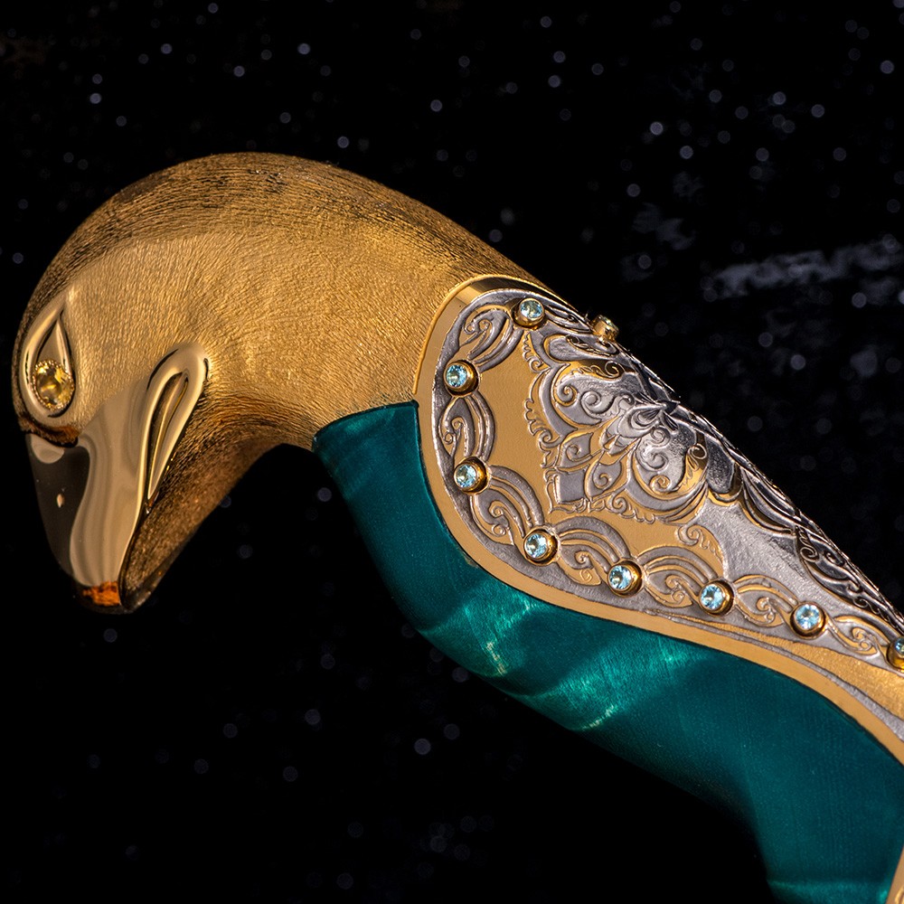 The hilt of the arab sword with the head of a golden falcon