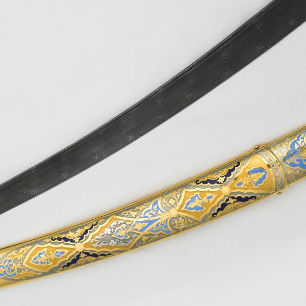 The sheath of the Arabic sword decorated with hand-engraved and artistic enamel in blue and blue.