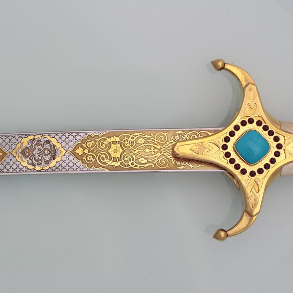 Gold sword blade decorated with gold pattern