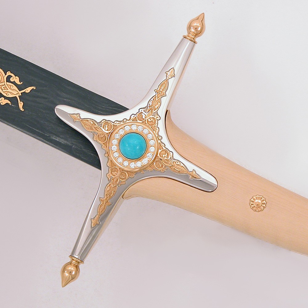 Decorated arabic hilt crosshair with blue stone