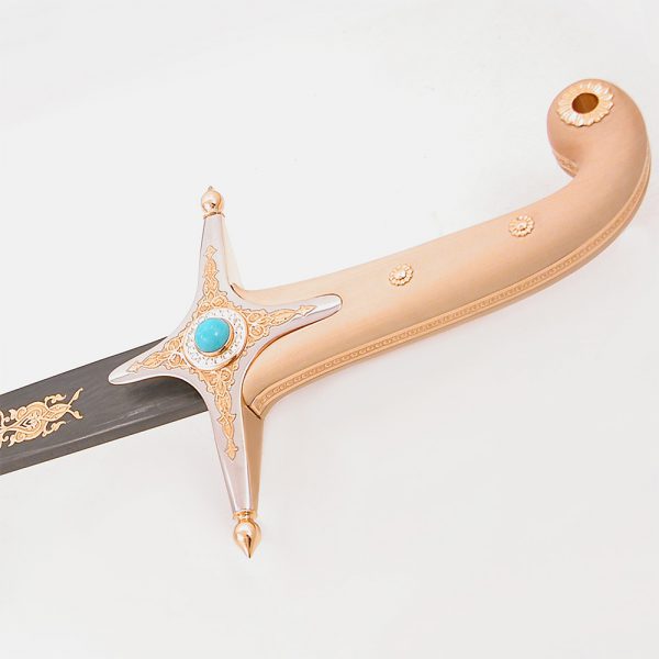 Luxurious wooden hilt of arabic sword shamshir