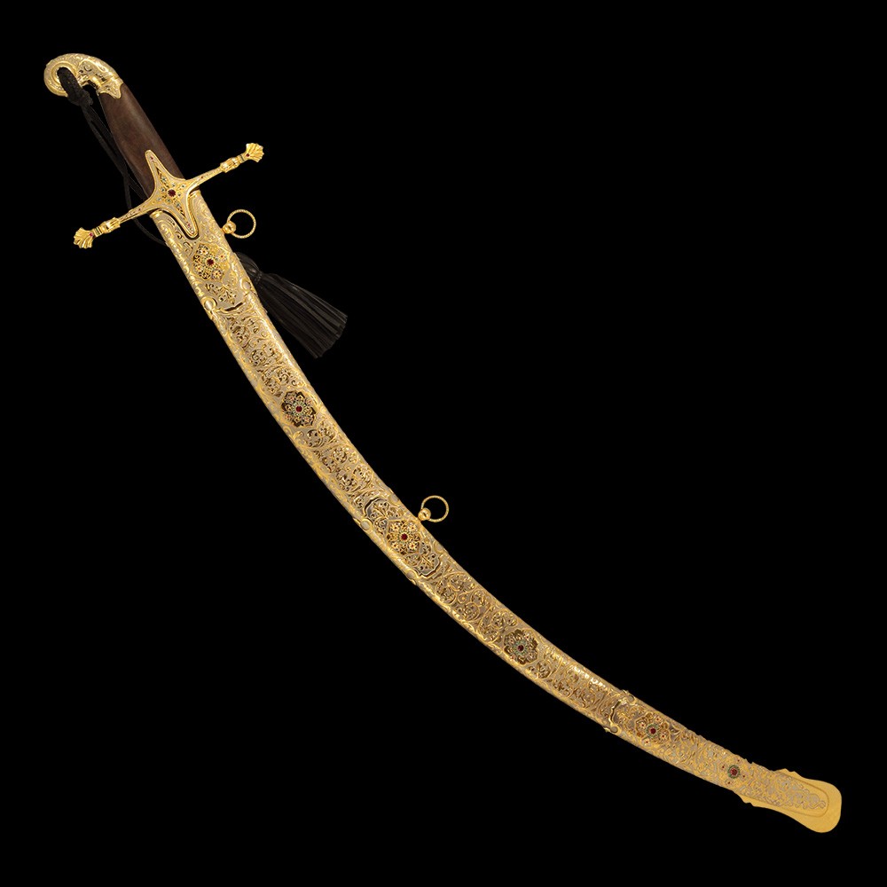 Eastern saber in a golden scabbard. Impeccable work of gunsmiths. Buy a saber