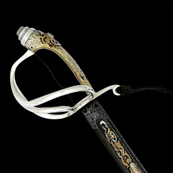 Silver hilt of a handmade luxury saber. New saber of Zlatoust gunsmiths