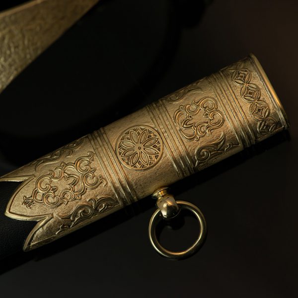 Cast elements of a scabbard of a souvenir epee.