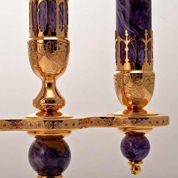 Golden candelabra combined with natural charoite stone.