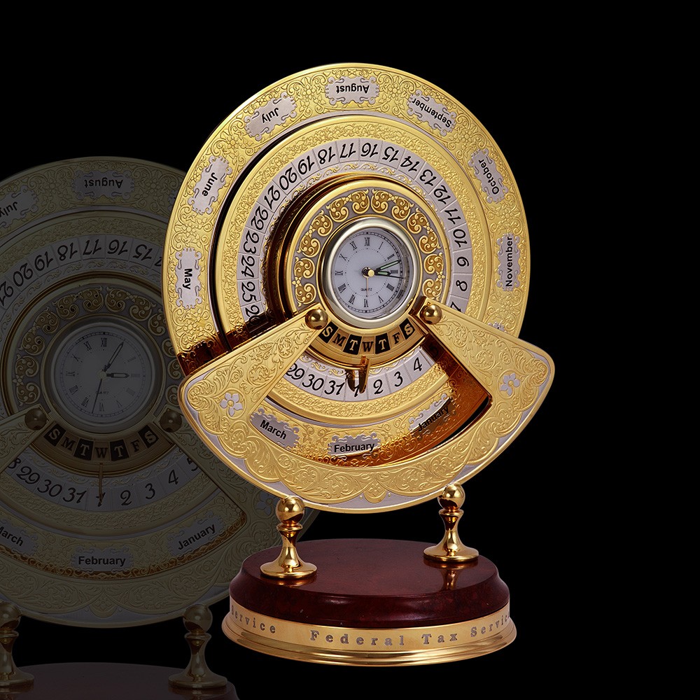 Office tools. Golden perpetual calendar for your office. Luxurious gift to the boss