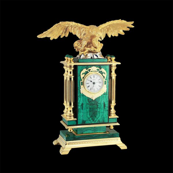 Monumentality of the clock is conveyed by a combination of simple forms of stone and classic columns. Columns made of metal have richly decorated capitals. The column surface is plated with pure gold.