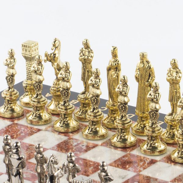 Cast chess pieces in gold plating. Luxurious corporate gift.