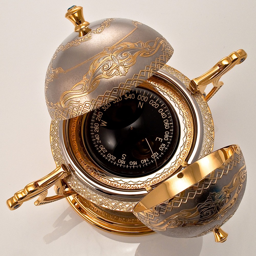 Corporate gift for the boss. The Golden compass is handmade from the President's masters.