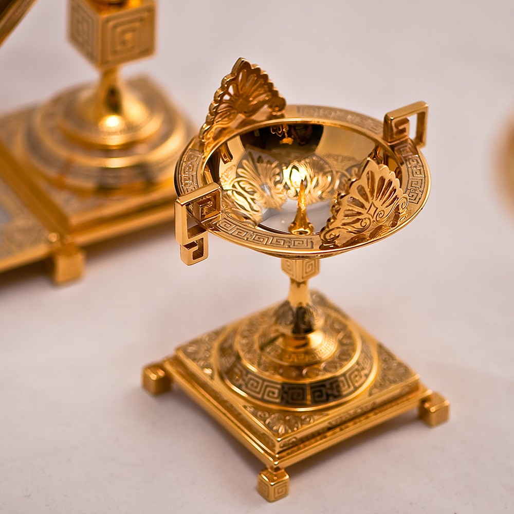 Golden candelabra in Greek style