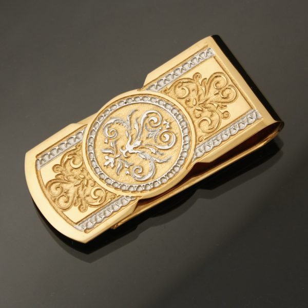 Gold money clip decorated with hand engraving