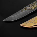 Pattern Damascus steel knife with gold applied