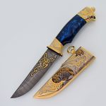 Drawing Damascus steel knife with gold coating and scabbard