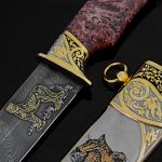 gold knife with scabbard