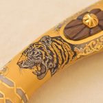 image of a tiger on the handle