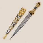 Decorative Damascus steel dagger depicting a rider, decorated with gold, cubic zirkonia and enamel