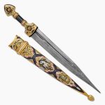 Decorative Damascus steel dagger depicting a rider, decorated with gold and cubic zirkonia
