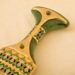 Jade dagger handle with gold inlays