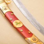 damasscus steel and red scabbard