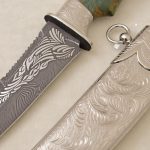silver scabbard and damascus blade
