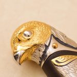 falcon head on a knife handle